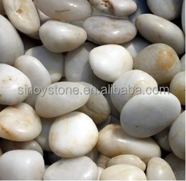 
white decorative pebbles round pebble wall stone 