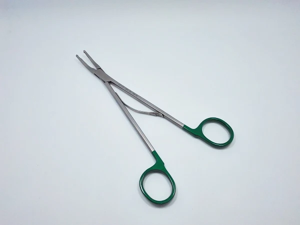 Surgical metal clip applicator for open and laparoscopic surgery