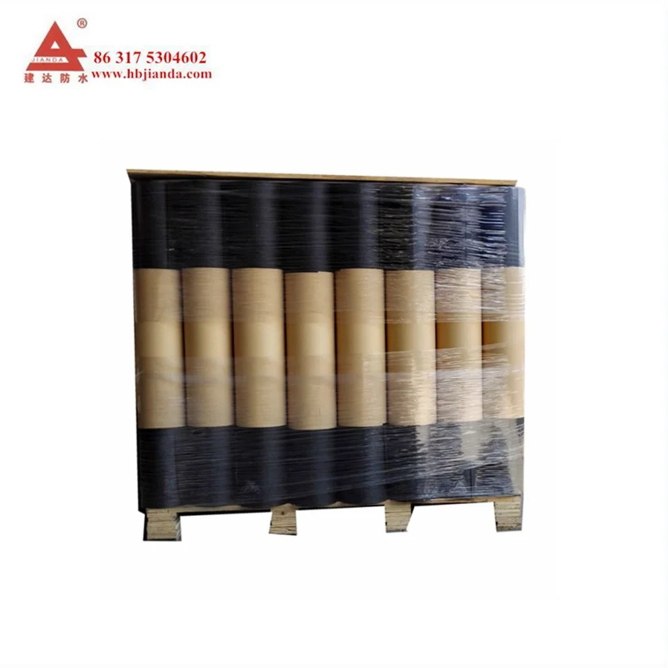 ASTM Asphalt Paper Rolling out the asphalt saturated felt paper in line with the drip edge