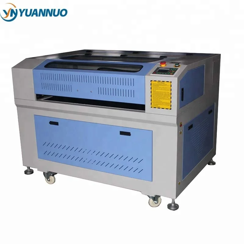 YN9060 YN1390 cnc laser engraving cutting machine on round objects