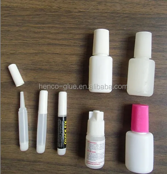 Super Glue in bottles with brush on