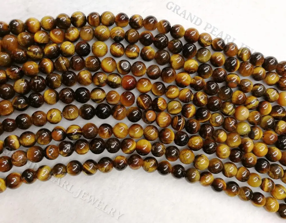 
Yellow / Brown Tigereye round beads in 16