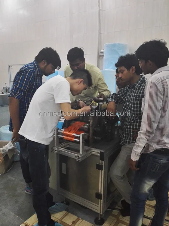 
disposable surgical nonwoven shoe cover making machine 