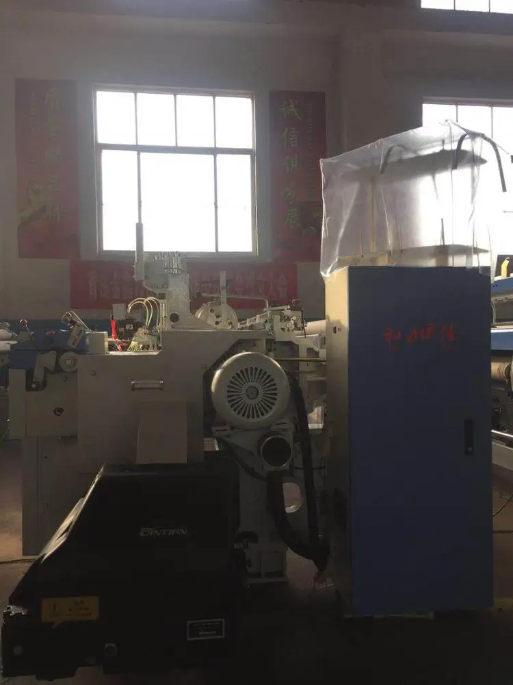 Textile weaving machine high speed air jet loom