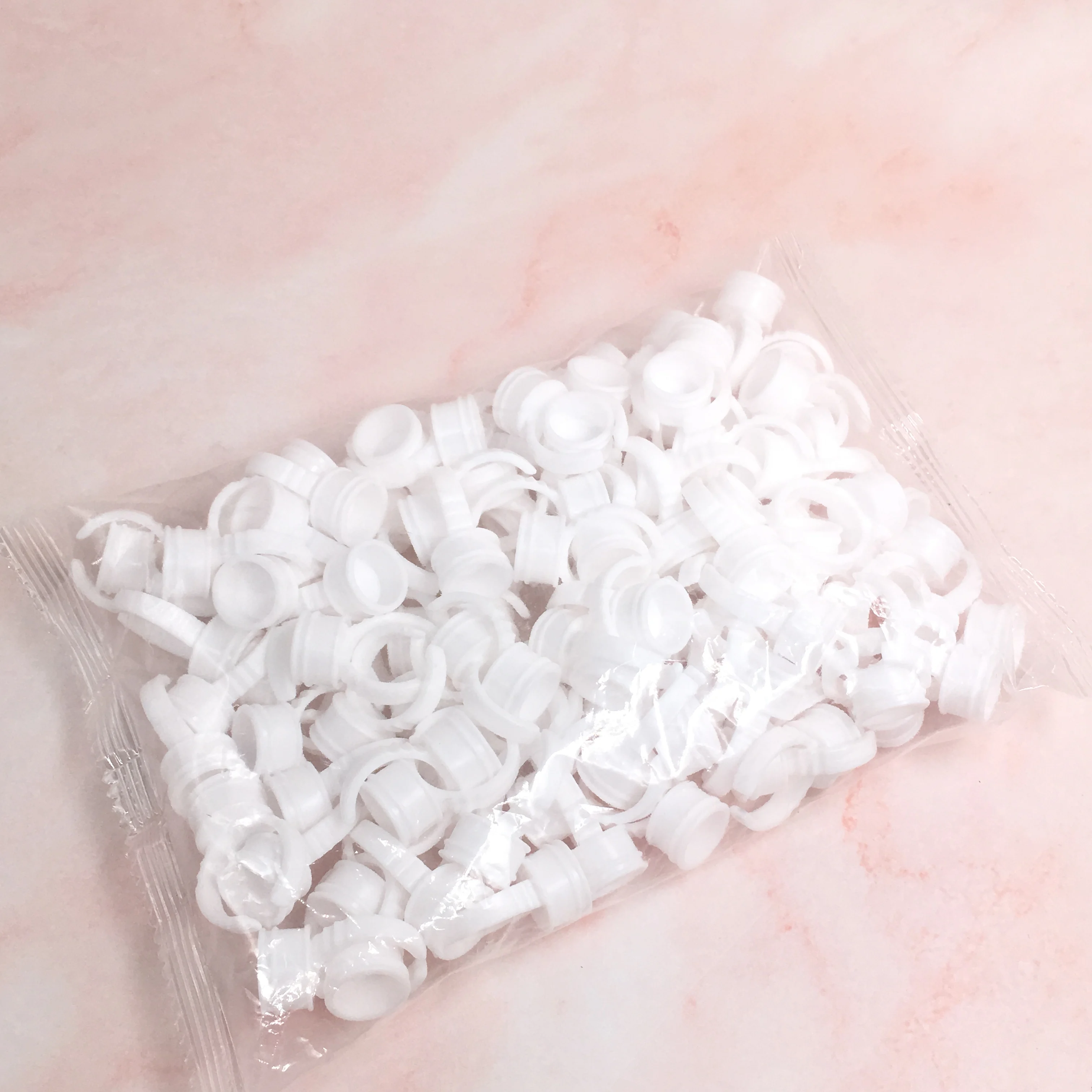 Wholesale Eyelash adhesive holder 100 pcs/pack Plastic Disposable Eyelash Extension Glue Plastic Eyelash Glue Rings