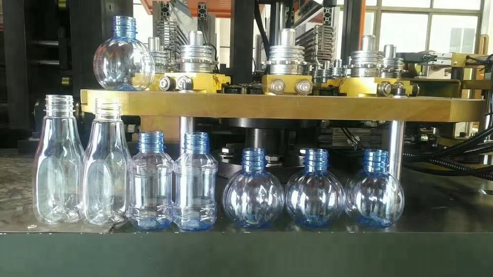 
Liquid soap JUICE plastic bottle pet blow molding machine 4CL 