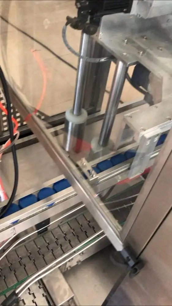 
Bottle packing machine Automatic Capping Machine for Bottle Tracking Type 2000-3000BPH 