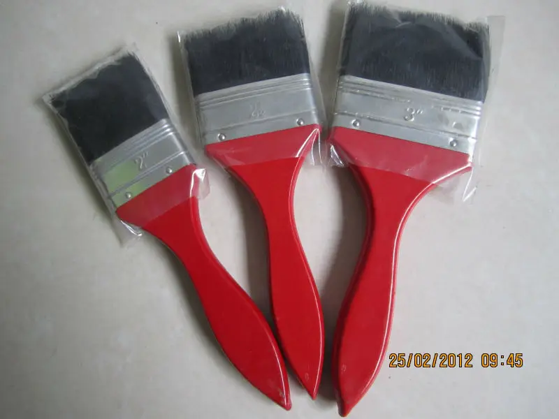 Paint brush with wooden handle