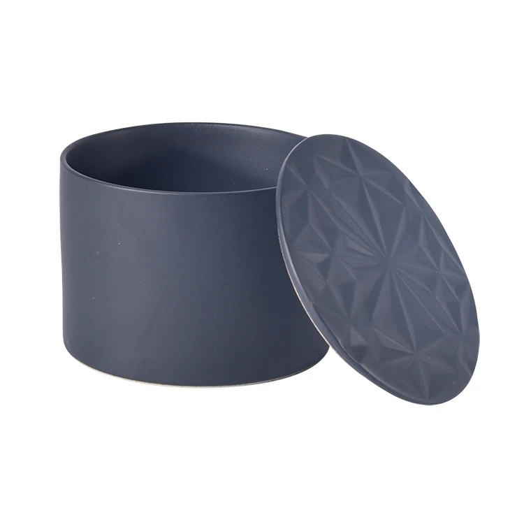 Cylinder snowflake embossed design unique empty matte black ceramic candle jar with lid