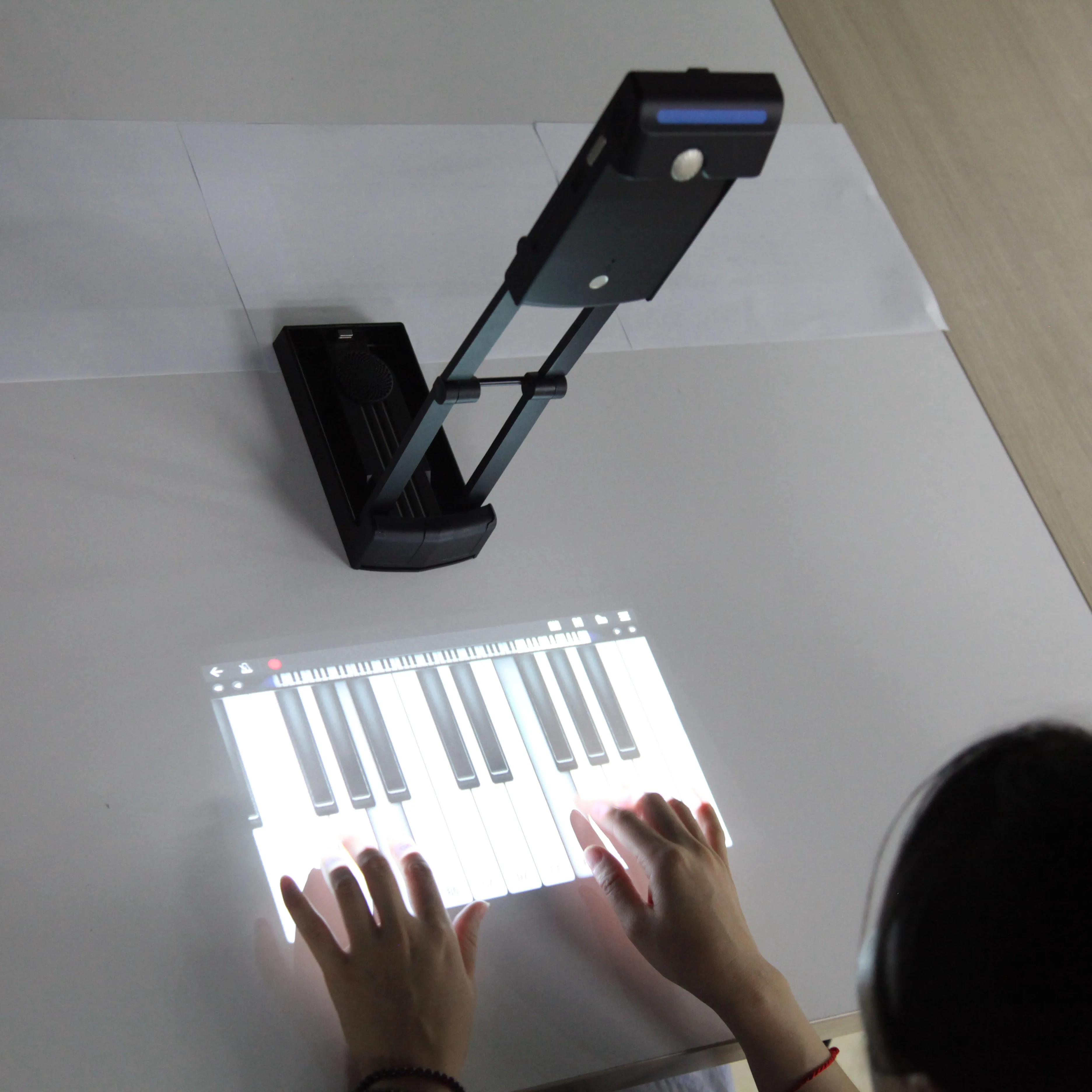 Portable interactive wifi multimedia projector,  laser image calibration technology