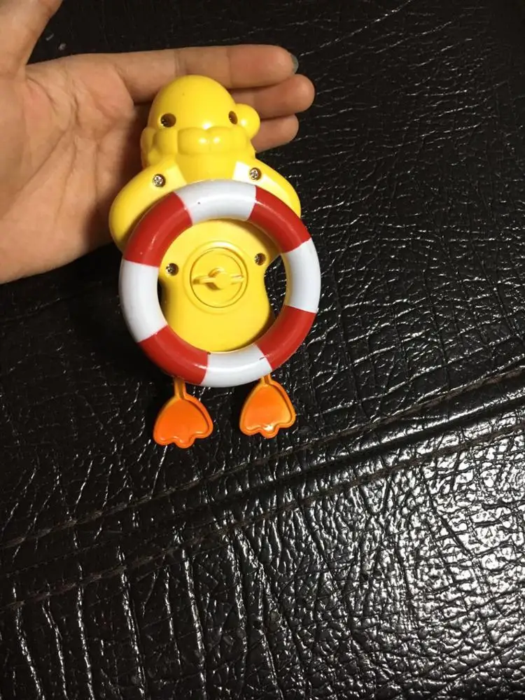 Wind up toy duck for baby bath toys play in water