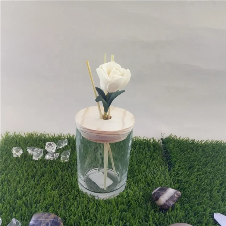 
2019 popular new design unique reed diffuser glass cup/glass jar with wooden lid with hole 