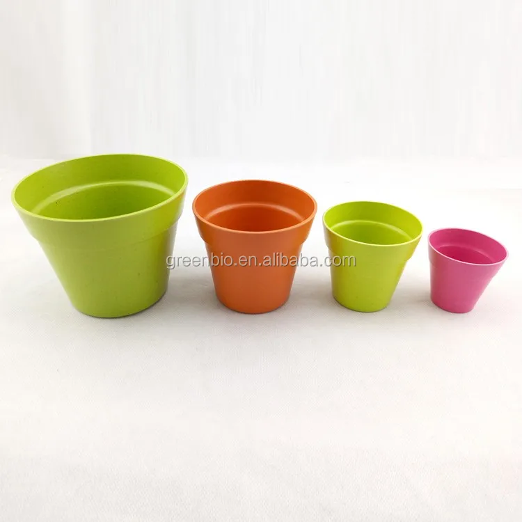 Round colourful plastic flower pot