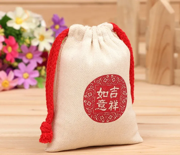 
black color cotton muslin drawstring bag with white logo 