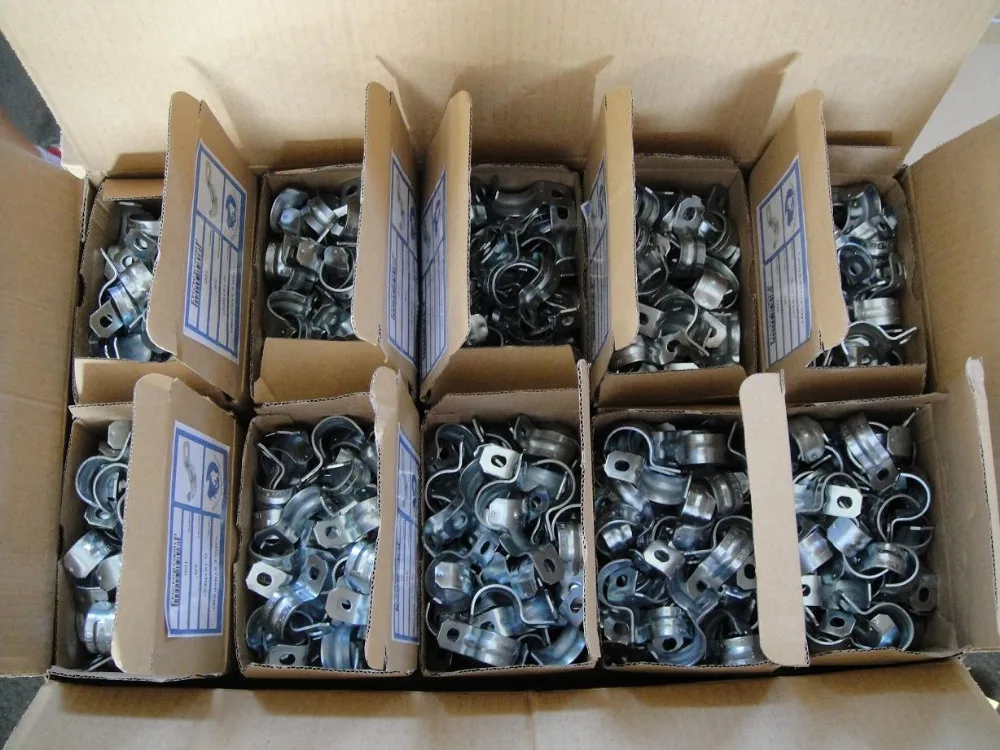 Universal one piece strut clamp, conduit clamp