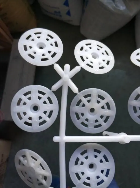 Plastic washer for EIFS fastener