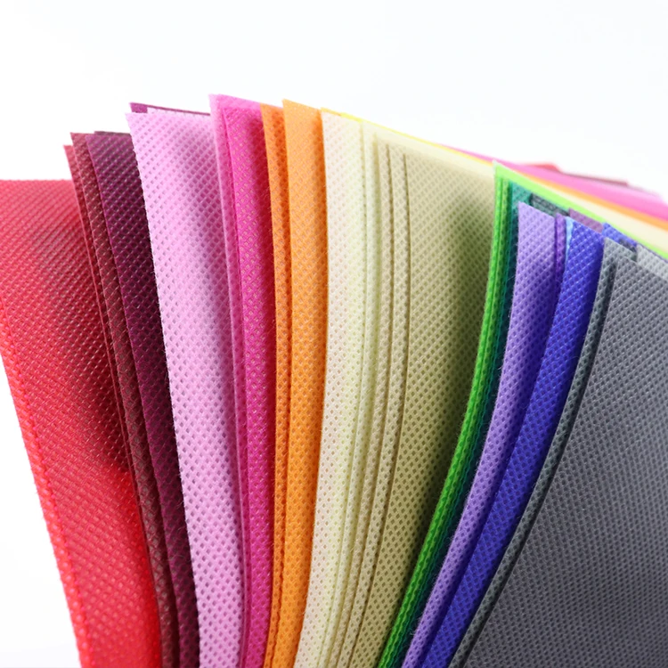 Colorful non woven cloth pp spunbond nonwoven fabric for bags making china manufacturer