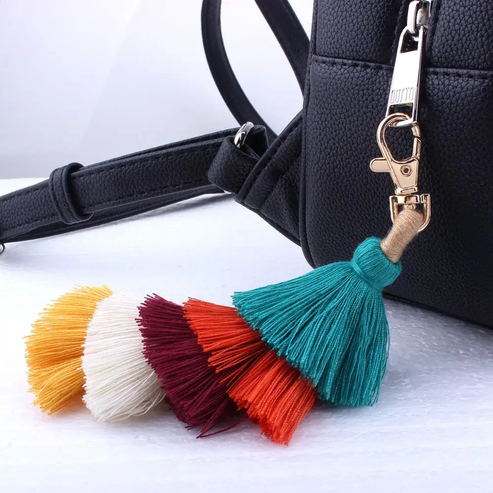 very popular  Handmade bohemian style pom pom tassel