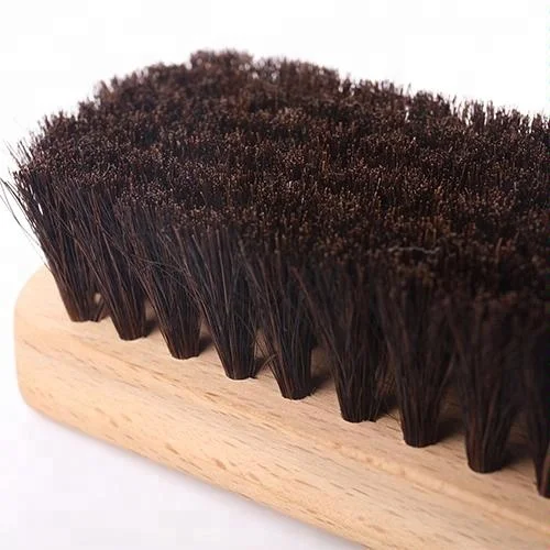 Scrub wooden dry brush in car washer