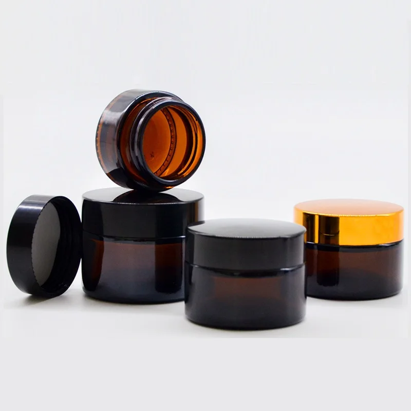 
Empty 30g 50g 100g amber glass cream jar with black plastic lid 