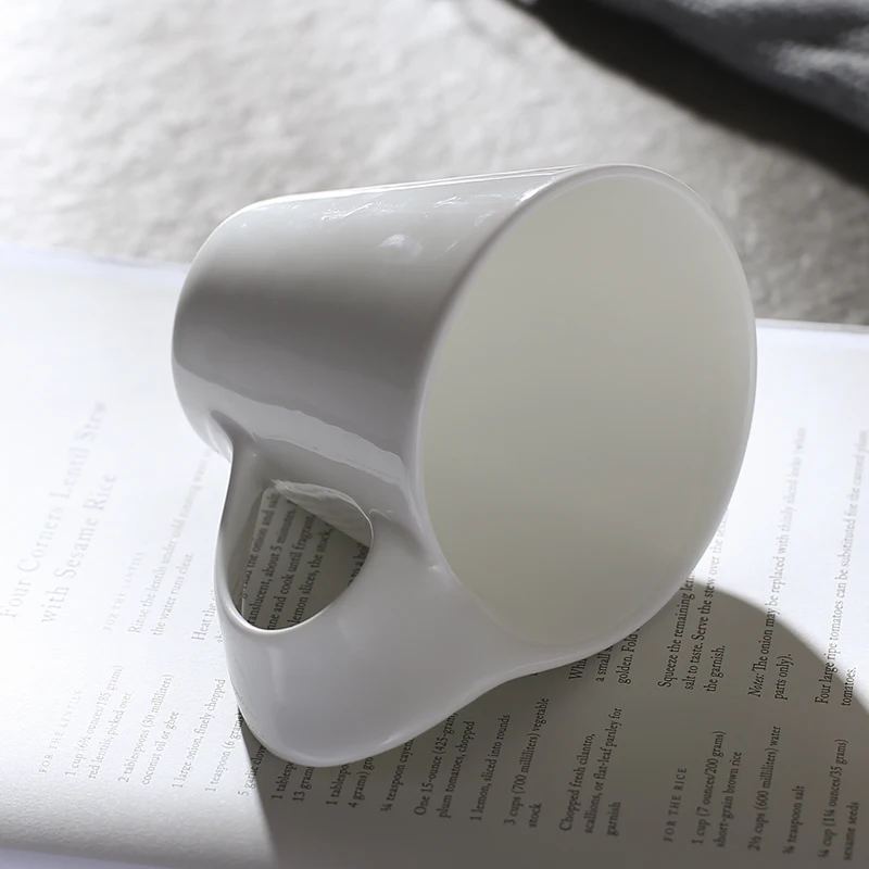 Novelty creative shape fine quality porcelain ivory 8oz fine bone china mug with wavy handle