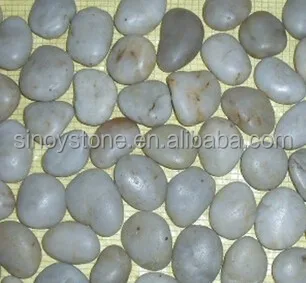 river pebble tiles landscaping natural glowing stone
