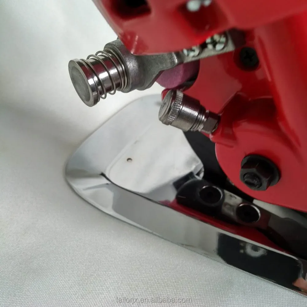 Red color RS-100 cutting machine for cloth with spare blade