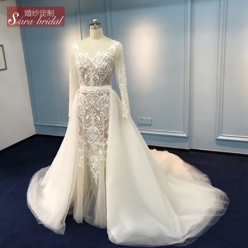 Long sleeve ivory mermaid wedding dress with detachable train