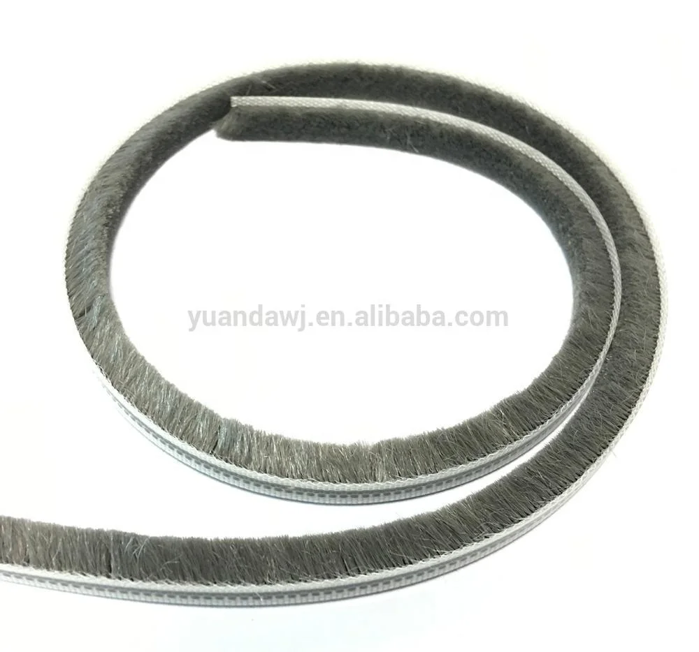 Wool pile weather seal strip door