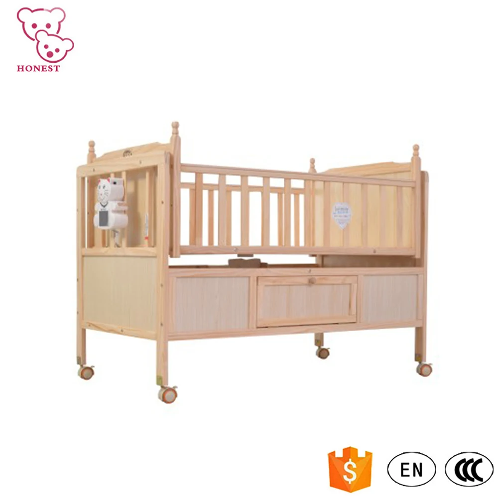 Solid wooden baby bed swinging crib for new born baby