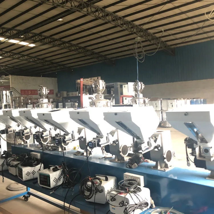 
Two-color Volumetric Doser in plastic mixer 