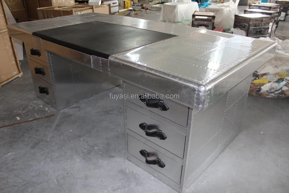 
aviator aluminum and leather covering office desk 