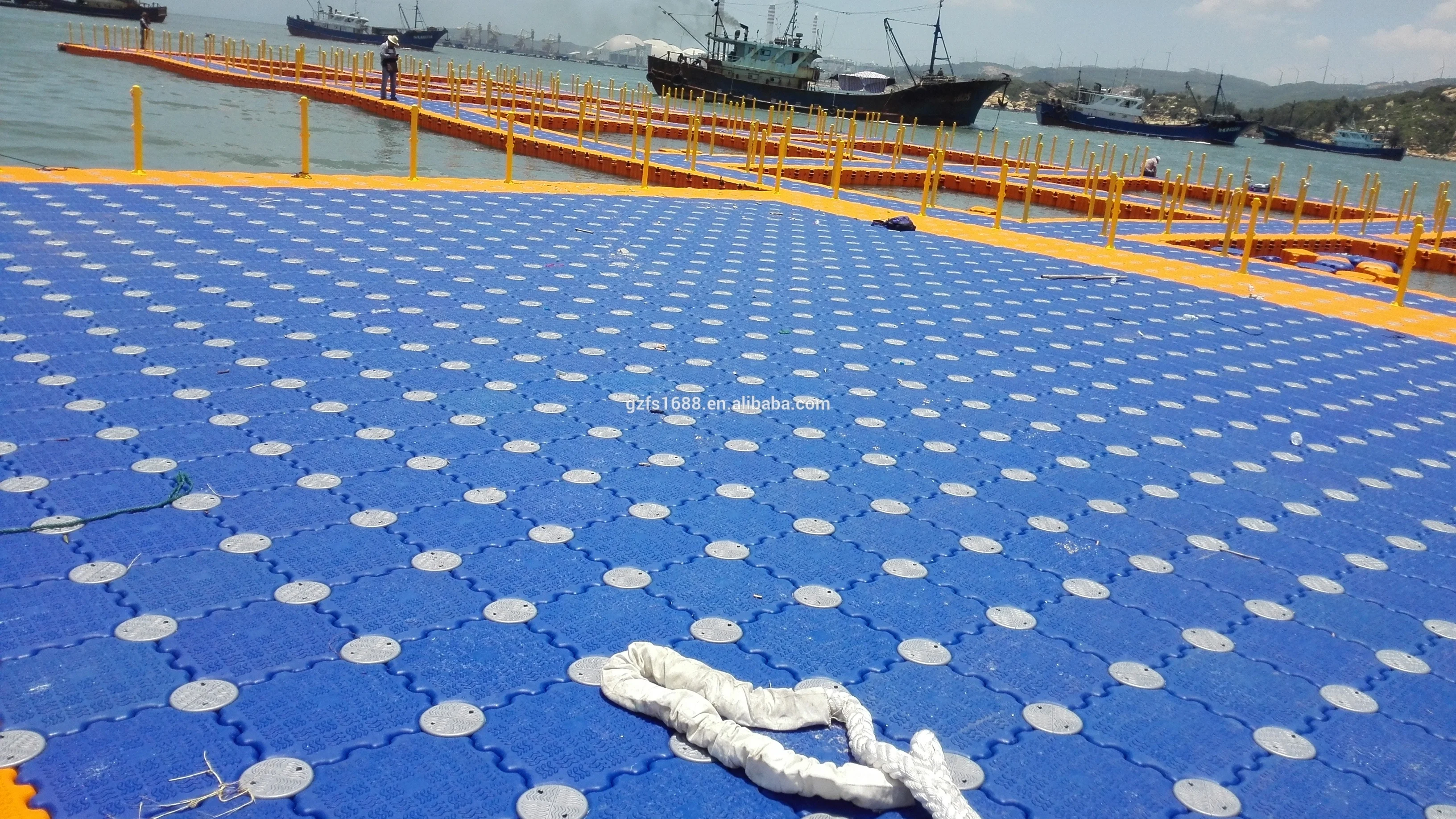 Floating swimming pool and floating bridge for water park