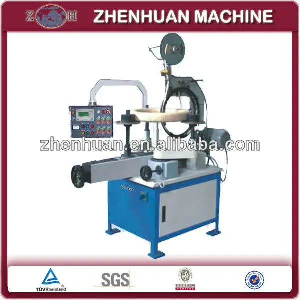 Dual-station toroidal coil winding machine and insulation tapping machine