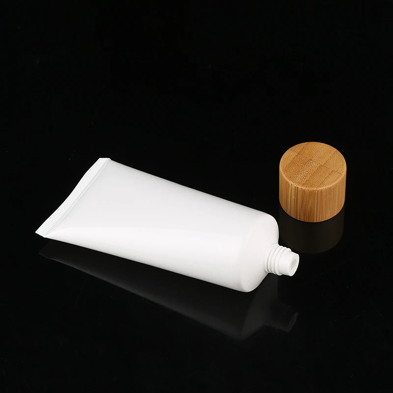 Empty cosmetic plastic soft squeeze tube with bamboo lid cleanser toothpaste container packaging