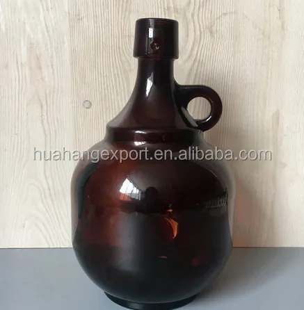 home-brewed 1/2 gallon, 1 gallon amber glass beer bottle with handle