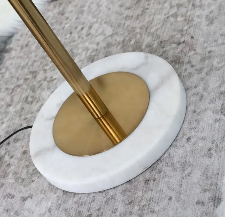 
modern graceful decorative golden metal LED floor lighting with marble holder 