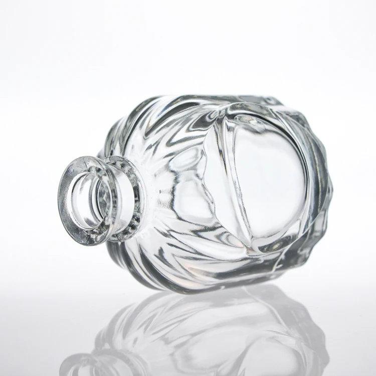 Luxury 100ml Embossed Logo Brand Clear Embossed Perfume Bottle Reed Diffuser Glass Bottle with Reed Rattan