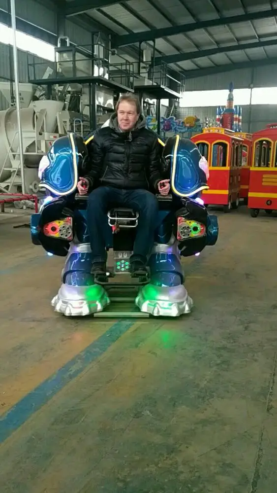 
amusement walking robot with music and laser fighting mode for adult and kiddie rides 
