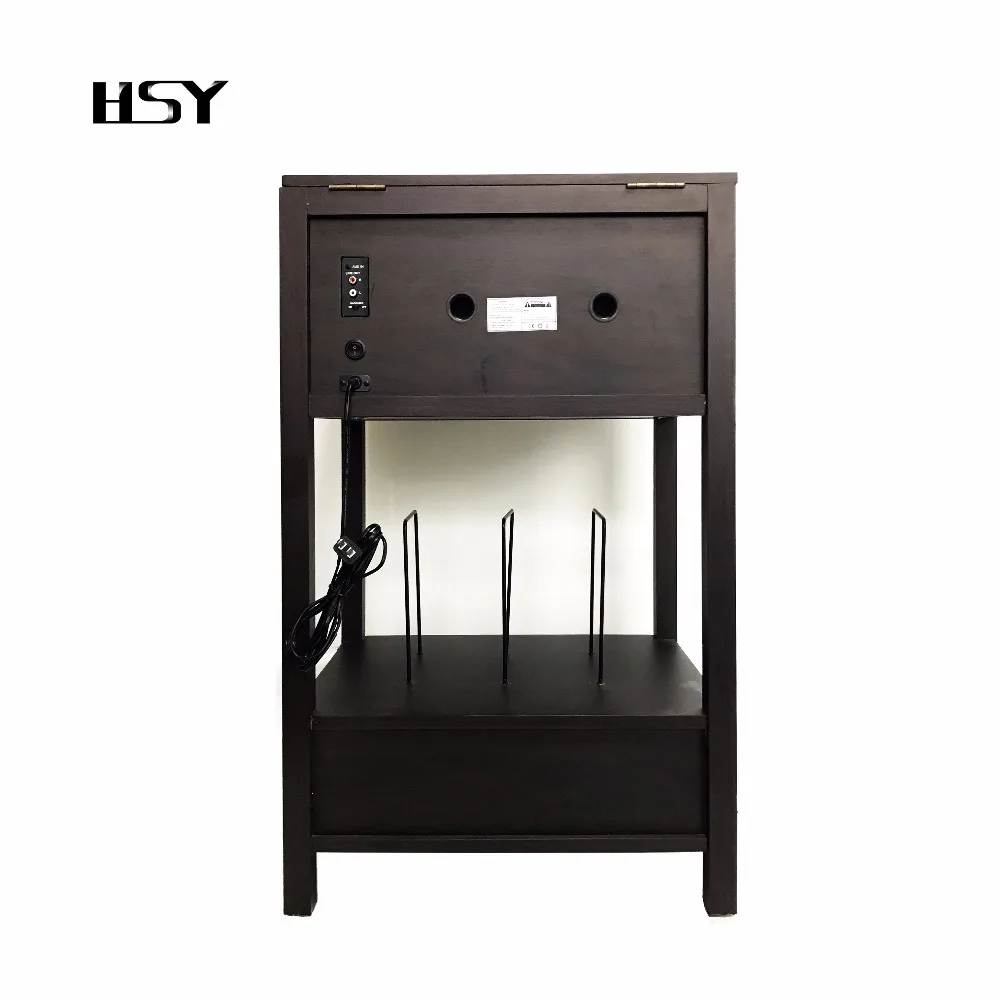 Vintage vinyl record turntable player with disc book shelf AM/FM stereo radio