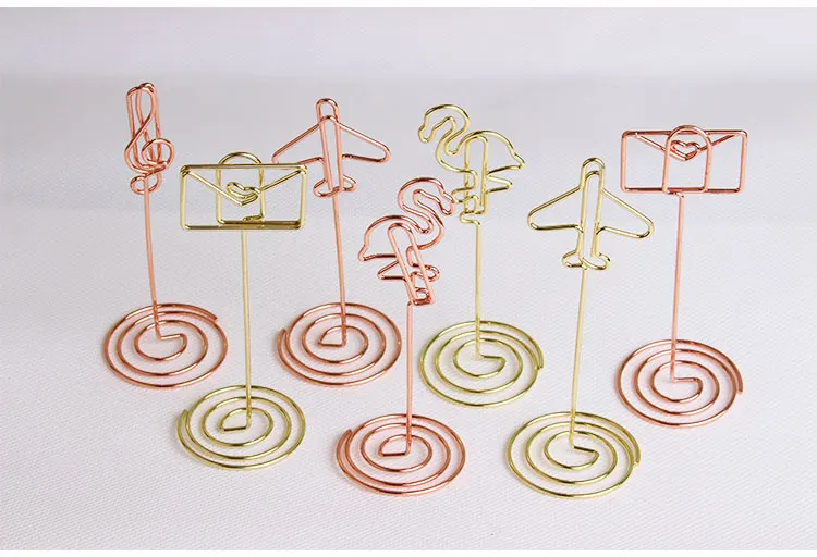 Metal wire shaped restaurant menu holder