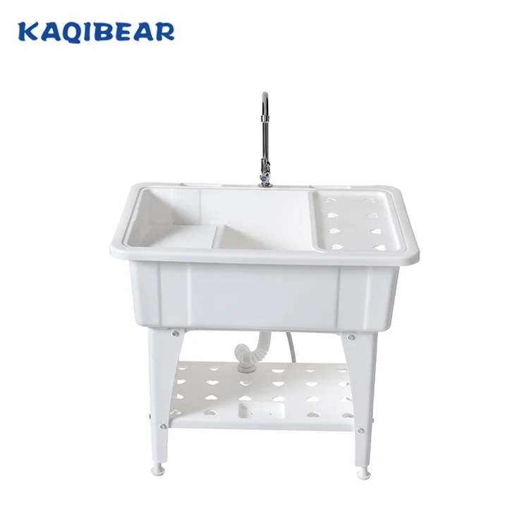 
Plastic laundry tub wash sink with a washboard 