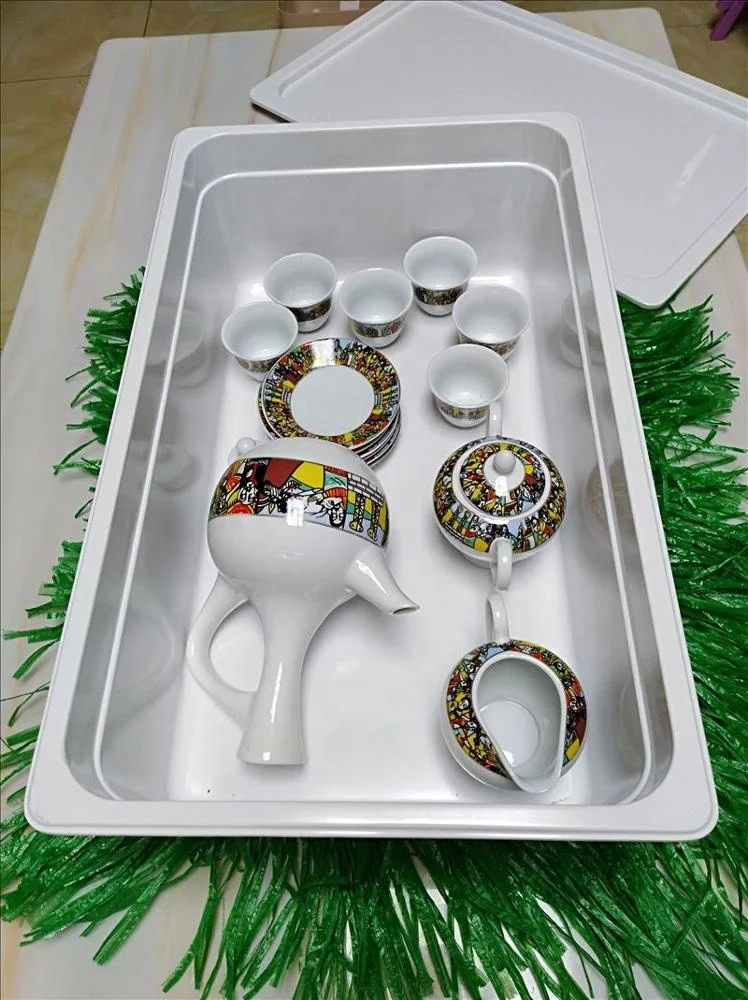 Coffee tray of rekebot for Ethiopian Eritrean Coffee ceremony with saba and tilet designs