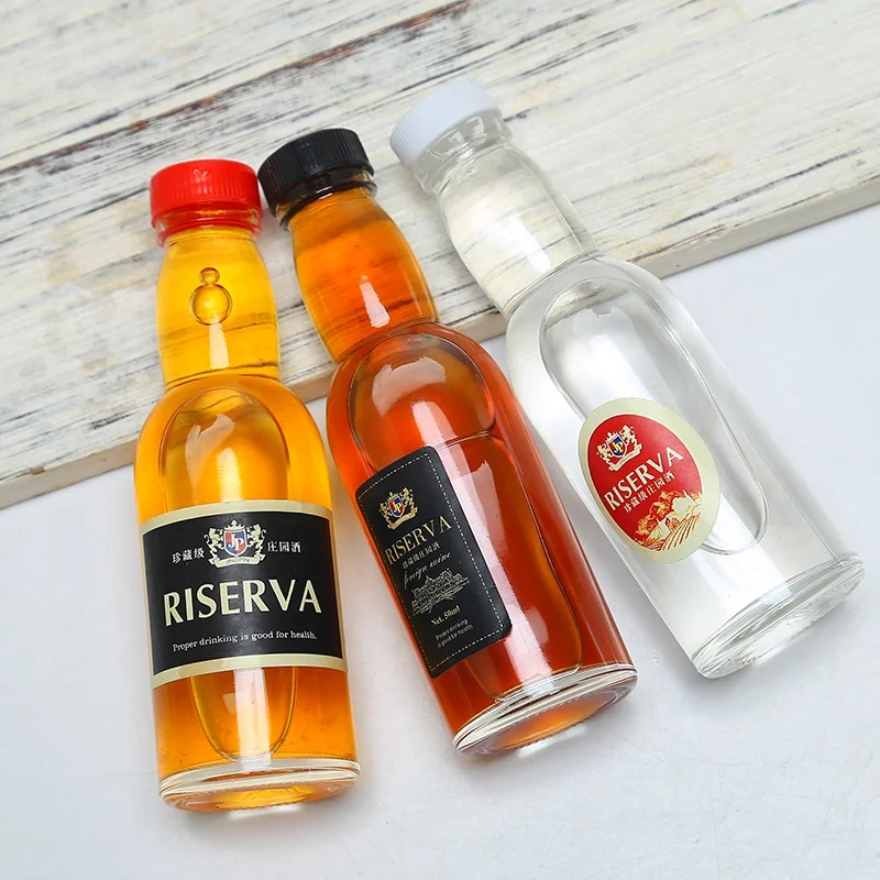 
High Quality 50ml Clear Empty Mini Round Glass Bottle For Liquor Alcohol Spirit With Screw Cap 