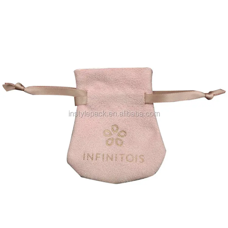 small pink velvet jewelry pouch with tassel drawstring