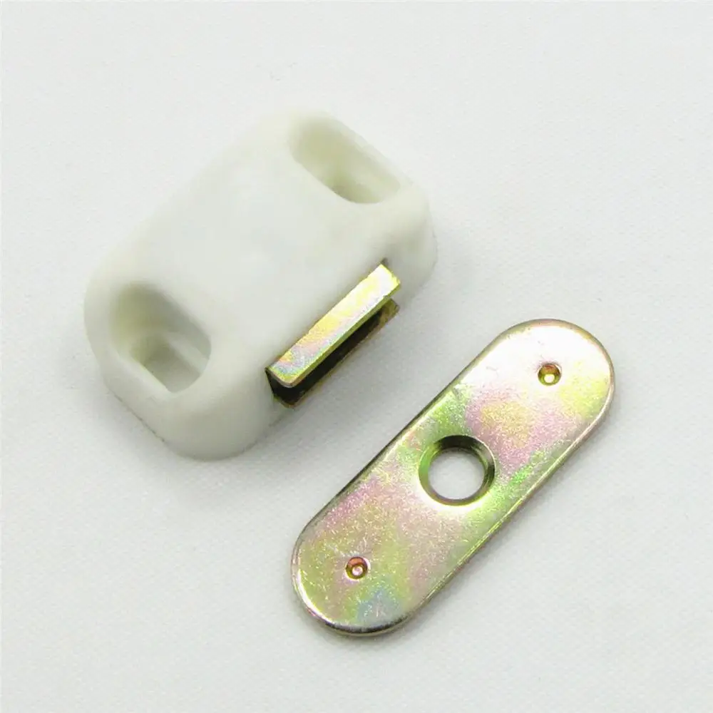 Magnetic door catcher with plastic housing