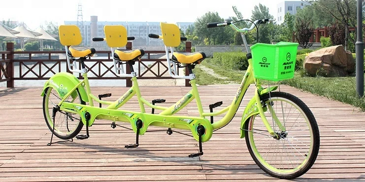 tandem bike with three seats for funny sightseeing tour and cycling