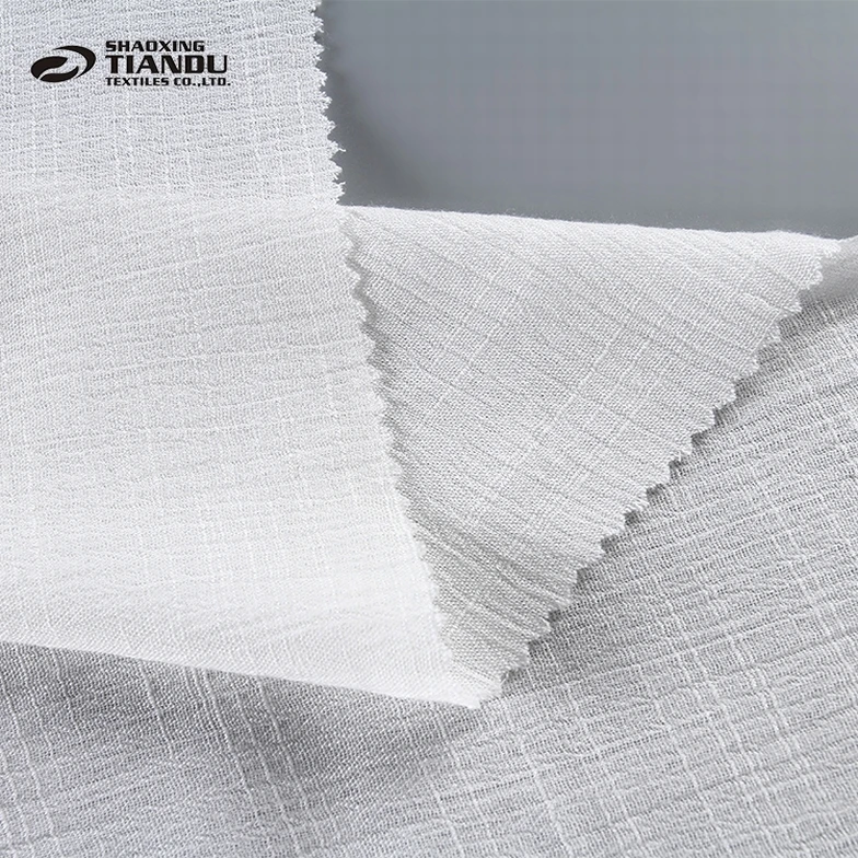 Most popular woven white crepe de chine examples of Spun rayon fabric