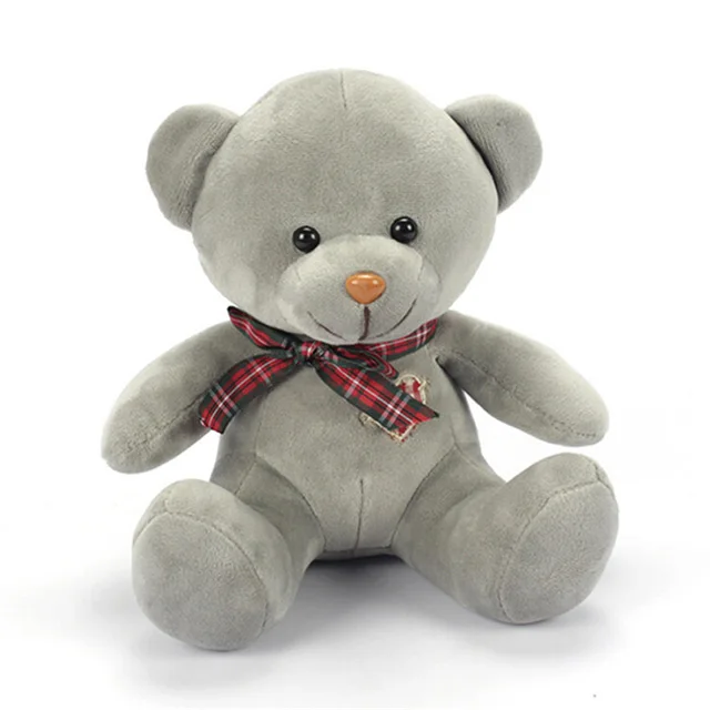 Cute White Stuffed Teddy Bear with a Bow Tie