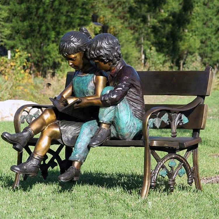 modern outdoor decoration bronze girl and boy reading on bench sculpture